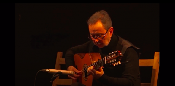 Rafael guitarist playing the flamenco solea